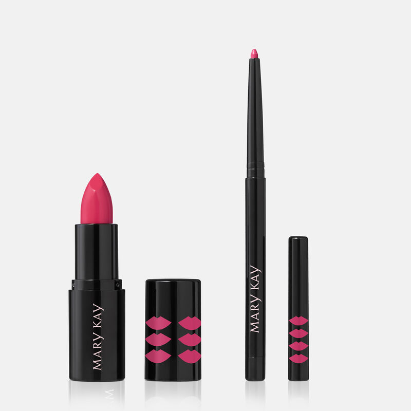 Limited-Edition Mary Kay Lip Kit in shade Pink, with tubes and caps standing against a gray background.